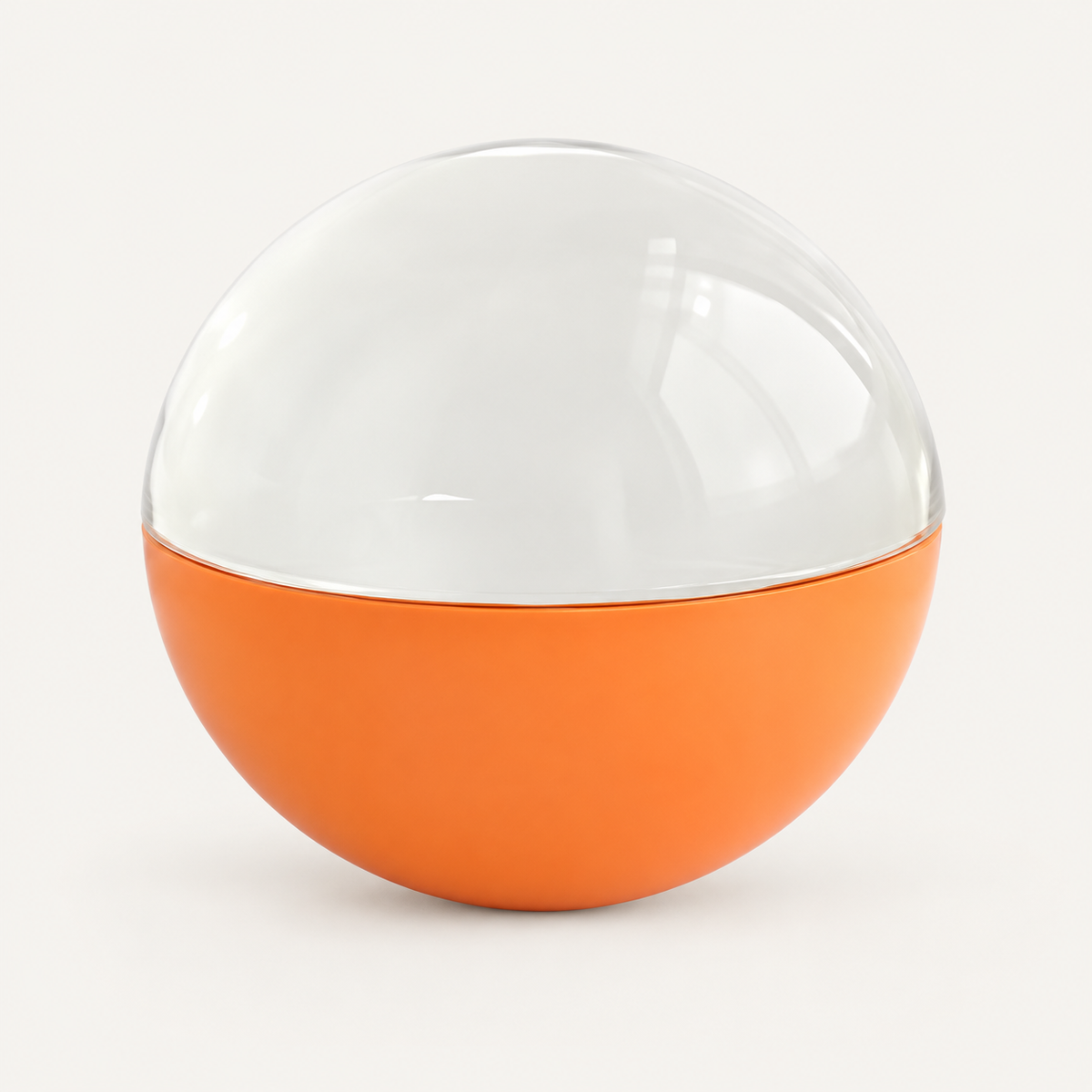 SoulSphere naranja, producto apagado. Fondo de estudio unificado a partir de la foto original.